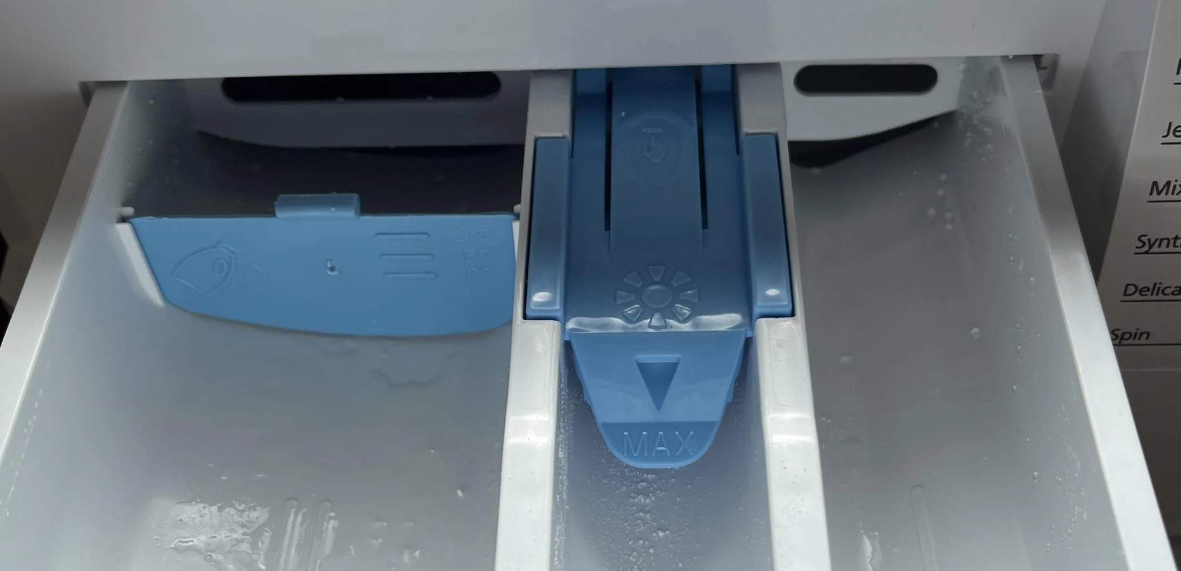 Mistério resolvido: qual é a função do terceiro compartimento da máquina de lavar